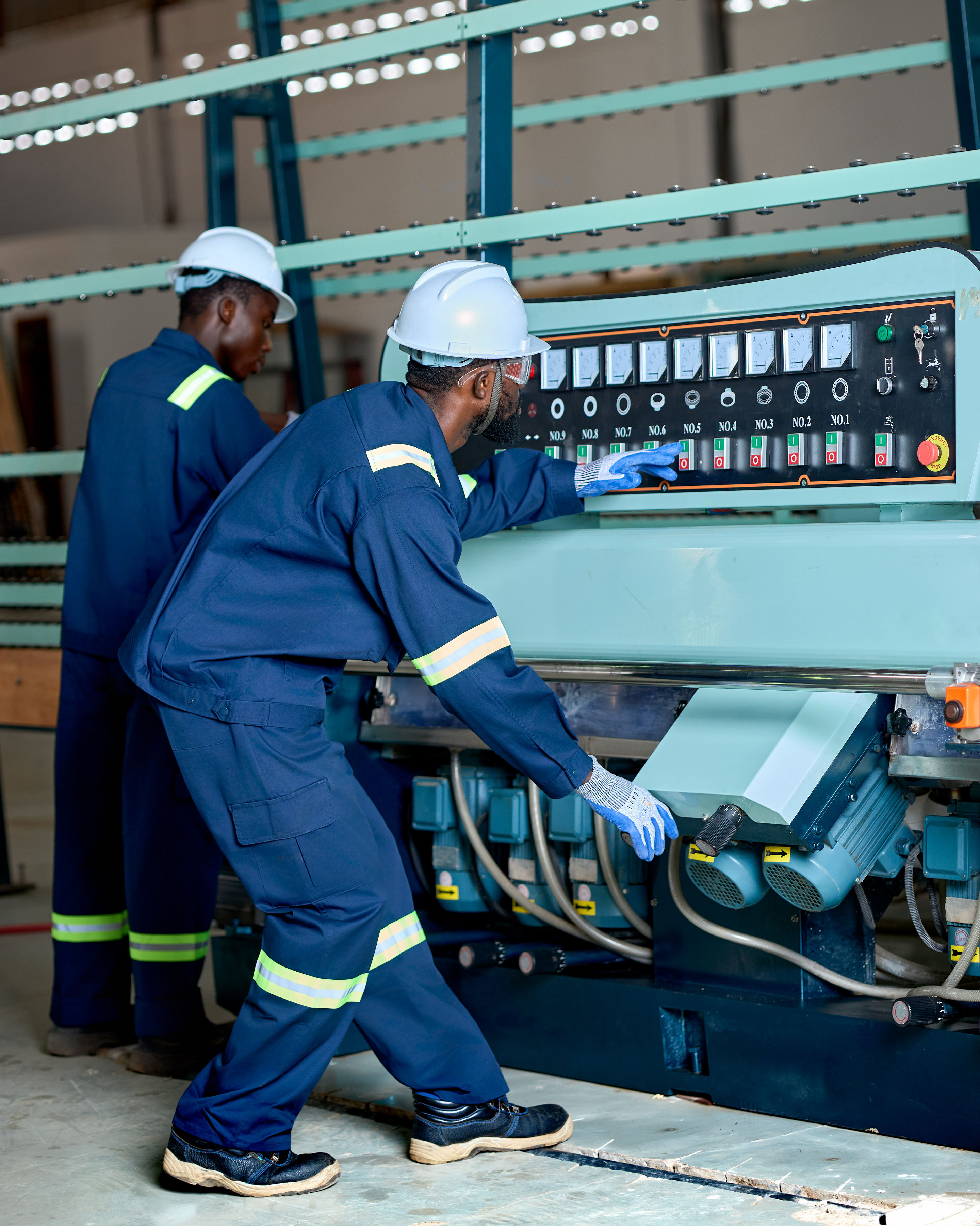 Sustainable glass project — two people reviewing plans
